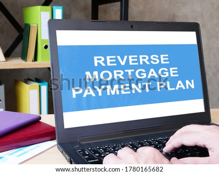 Reverse Mortgage Payment Plan is shown on the conceptual business photo