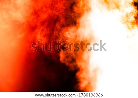 Powerful flame from a summer fire. Textured background of a flame from a night fire with space for text.