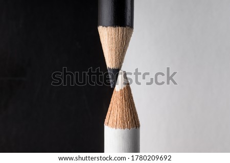 White and black pencils. Contrast and opposite concept
 Royalty-Free Stock Photo #1780209692