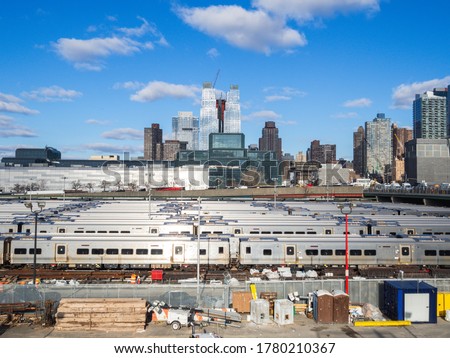 silver train yard in summer in a big city on a sunny day