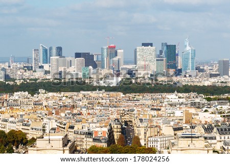 La Defense skyscrapers, Paris, France. La Defense is a district with the modern business buildings on the outskirts of Paris. The look at cityscape of Paris from above. Panorama of Paris in summer.