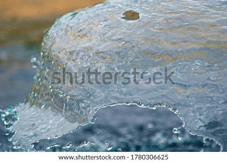 Close up image of clear water from a fountain