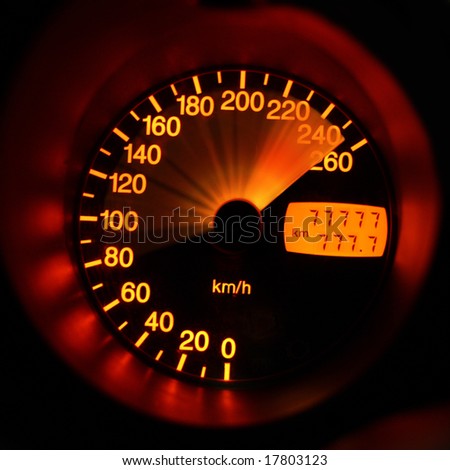 Accelerating sport-car speedometer closeup