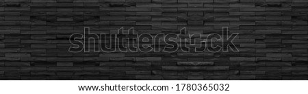 panorama black brick wall of dark stone texture and background ,paranomic stone floor wide picture                          