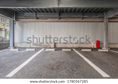 Empty space car park interior at office building