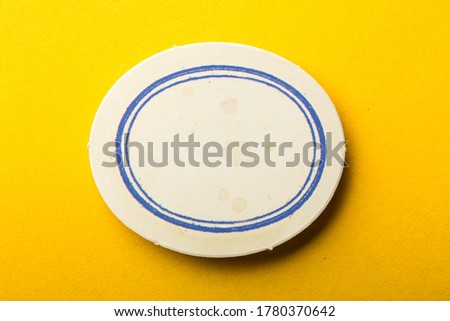 Blank frame label with shadow on yellow background.