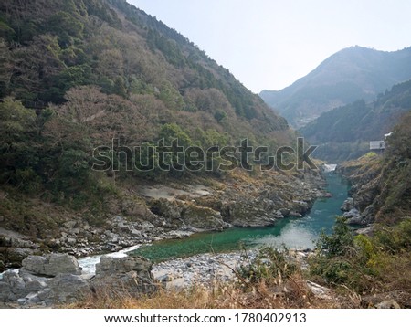 Mountain river with Transparent, turquoise, clear water, with rocky riverbed and shore, Oboke Gorge, nature of Shikoku, Japan