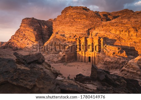 The Monastery or Ad Deir at beautiful sunset in Petra ruin and ancient city of Nabatean kingdom, Jordan, Arab, Asia Royalty-Free Stock Photo #1780414976