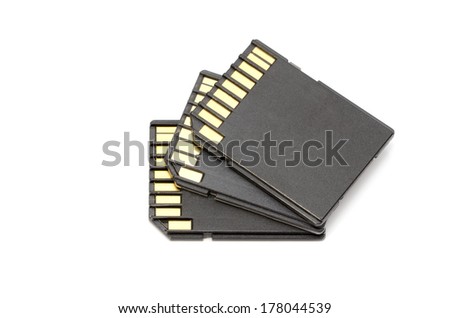three secure digital compact flash memory sticks are isolated on a white background. 