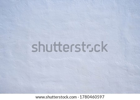 Whitewashed wall background texture, white color painted outdoor wall, traditional architecture in Mediterrannean, Greece