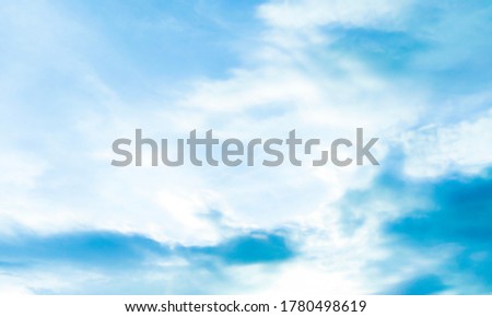 Beautiful blue sky and white clouds of various shapes with sunlight. Nature background Royalty-Free Stock Photo #1780498619