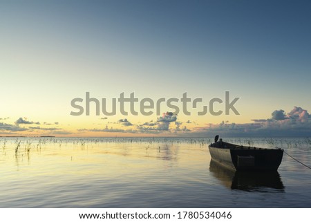 
Sunrise near the Curonian lagoon Nida, Lithuania. Royalty-Free Stock Photo #1780534046