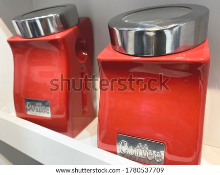 Retro style coffee jar in bright red color
