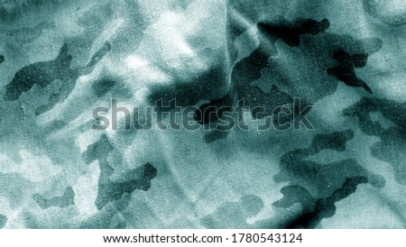 Military uniform pattern with blur effect. Background and texture for design