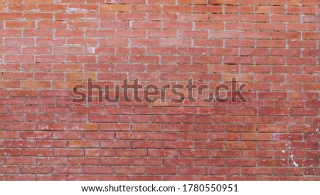 Red brick wall texture grunge background to interior design. Modern loft style