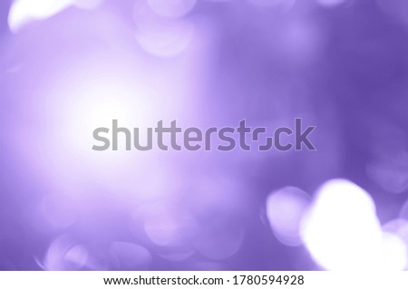 Purple and violet light  leaves blurred and blur natural abstract. Effect sunlight  soft bright shiny style  bokeh circle yellow and orange blurry morning . For wallpaper backdrop and background.
