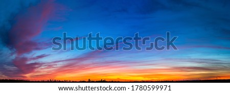 Natural Sunset. Bright Dramatic Sky And Dark Ground. Landscape Under Scenic Colorful Sky. Sun Over Skyline, Horizon. Transcarpathia and Uzhhorod. Magic Sunset. Dusk. Clouds. Panorama