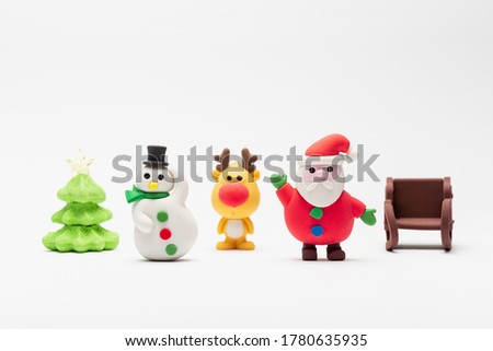 close up of christmas elements blister eraser with white background