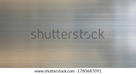 Metal texture bright gray background with reflection