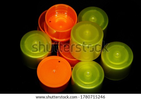 Colorfull round plastic with a spiral inside,Workpieces come out from the injection molding machine.