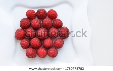 Raspberries isolated on white background, close up