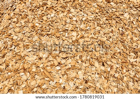 background - pile of wood woodchips, woodworking waste Royalty-Free Stock Photo #1780819031