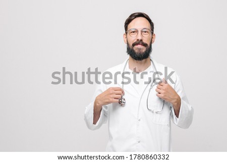 close-up portrait of young male doctor in uniform with stethoscope. medical concept. High quality photo