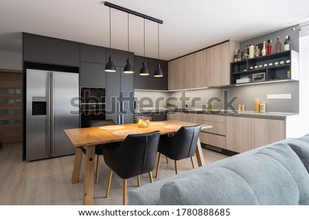 Dining table in kitchen of modern house Royalty-Free Stock Photo #1780888685