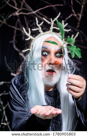 31 october. Halloween Devil with professional makeup. Halloween man. Devil man on Halloween night. Bearded man ready for party. Horror man faces. Halloween decoration and scary concept.