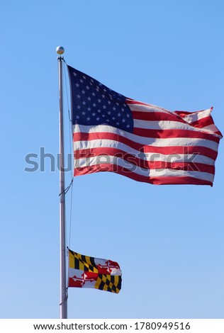 United States flag and Maryland flag hanging.