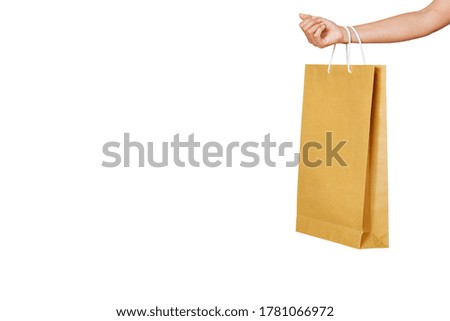 woman hand hold paper shopping bag on white, clipping path, shopping concept
