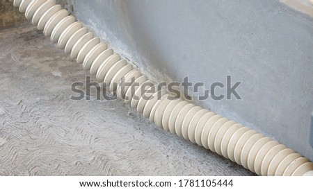 Close up of the drain hose in the washing machine Royalty-Free Stock Photo #1781105444
