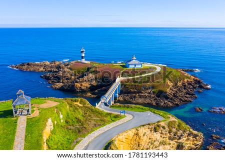 aerial view of Illa Pancha Lighthouse in Ribadeo Galicia Spain Royalty-Free Stock Photo #1781193443