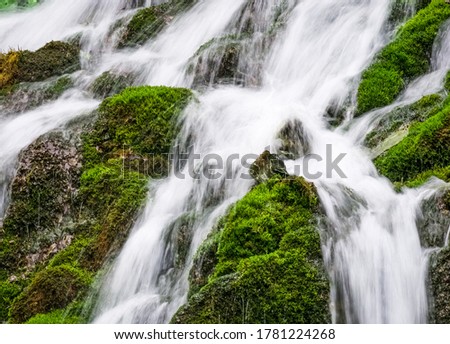 Foamy Valley Waterfall in Bucegi mountains accessible from Busteni town. Long exposure picture of a waterfall.