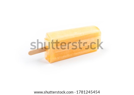 Cantaloupe popsicles placed on a white background