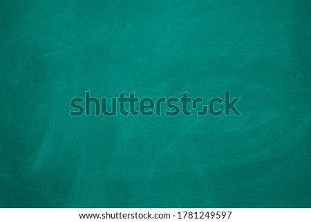 Abstract texture of chalk rubbed out on green blackboard or chalkboard background. School education, dark wall backdrop or learning concept. Royalty-Free Stock Photo #1781249597
