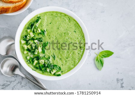 Cucumber Gazpacho. Green fresh cold summer soup. Top view Royalty-Free Stock Photo #1781250914