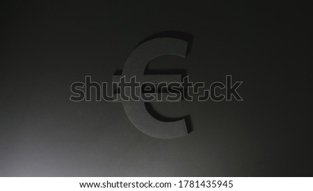 Black Euro symbol on a black background
