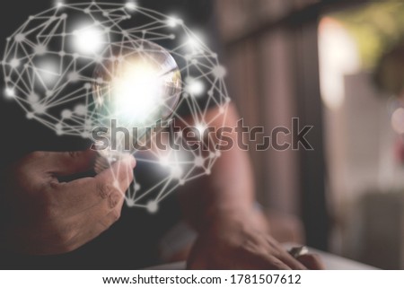 Selective focus. Concept of idea and innovation. Businessman hand holding lightbulb. Man holding light bulbs with innovative technology and creativity. soft focus.