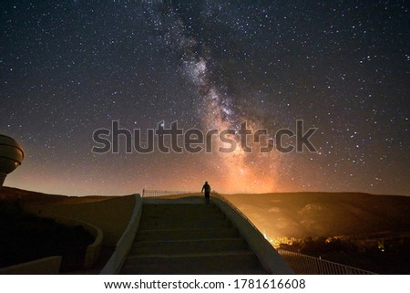 Person on grand staircase watching the Milky Way, Stars, night time, long exposure
