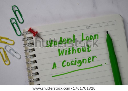 Student Loan Without A Cosigner write on a book isolated wooden table.