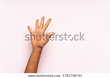 Hands counting numbers over isolated background
