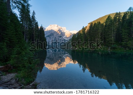 Mountain landscape with reflections on the Braies lake in Val Pusteria, South Tyrol Dolomites Royalty-Free Stock Photo #1781716322