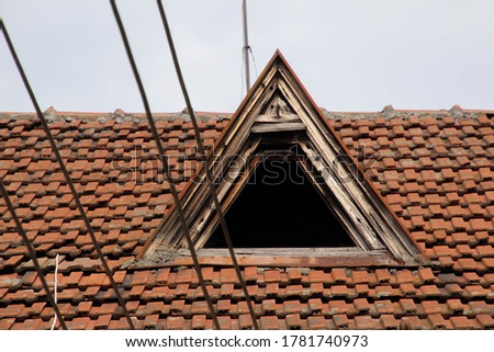 An abstract photo of a window on roof top