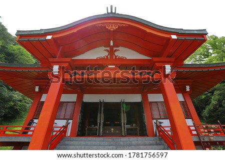 Red painted temple in Japan. Translation: traffic safety