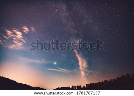Jupiter and Saturn planets and  Milky Way in the night sky.