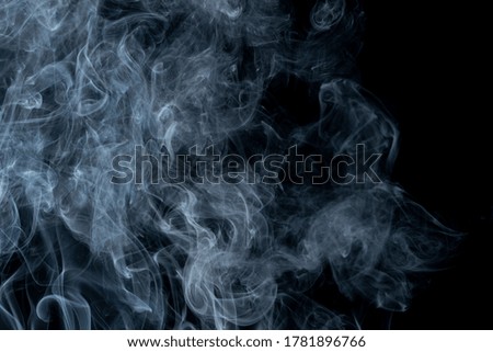 white smoke on a black background, good to be added on food photography