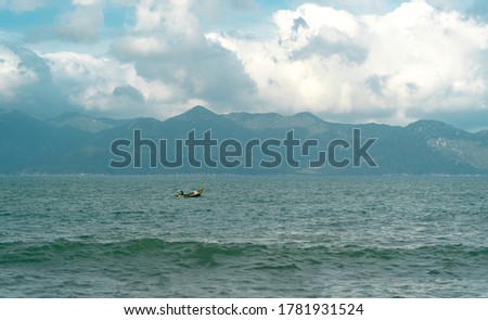 a boat at sea, a fishing boat