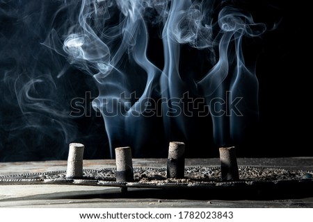 Smoke coming out of Dhoop (incense sticks)