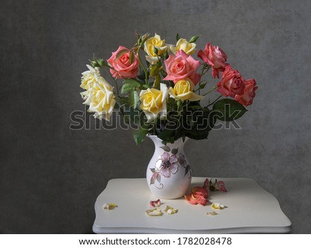 Still life with splendid bouquet of roses	